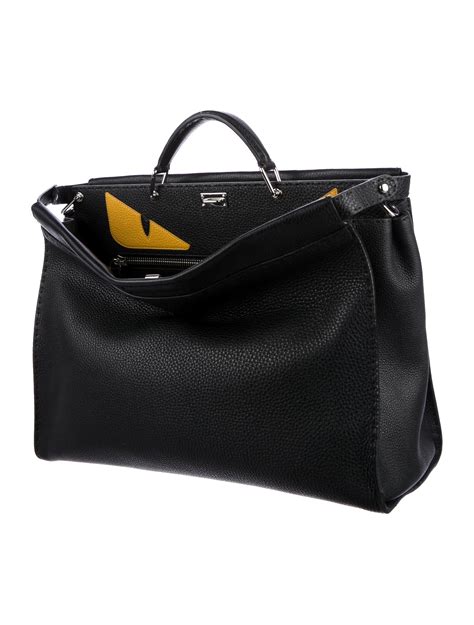 fendi monster briefcase|Fendi peekaboo monster bag.